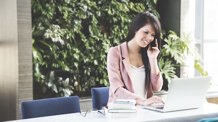 woman-phone-professional-computer-desk